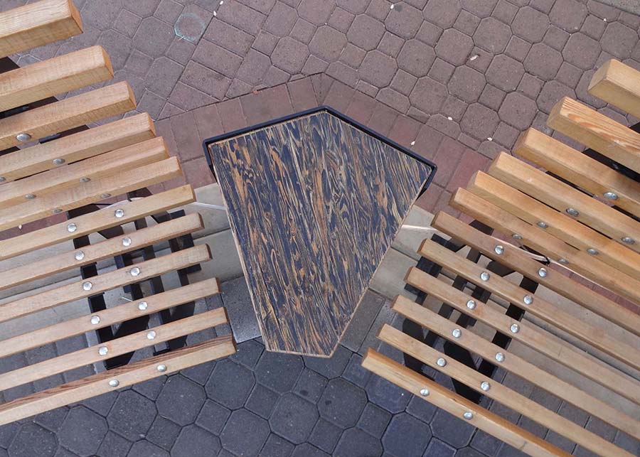 closeup of the timber benches and hard-wood sidetables